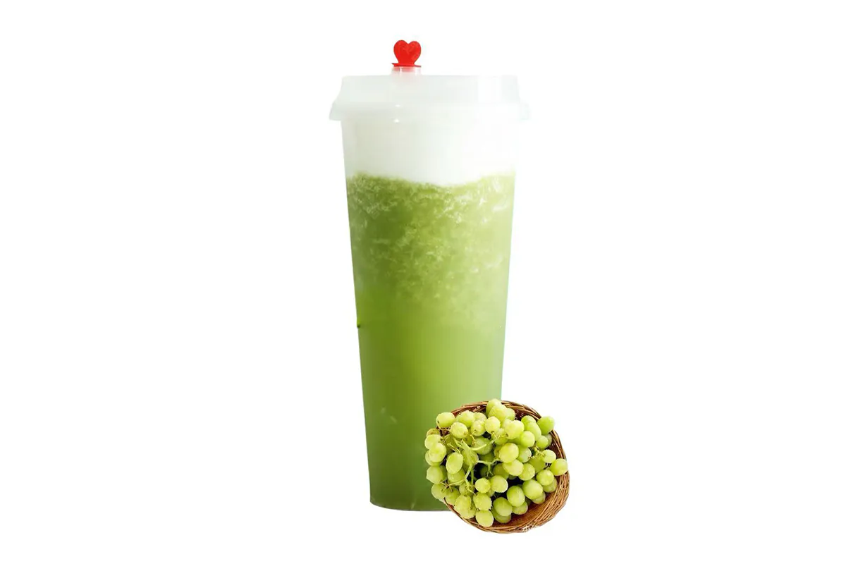 Green grape jasmine slush with cheese foam, fresh grapes on the side at Poke Tea, a Poke Bowl & Bubble Tea Shop in Hayward